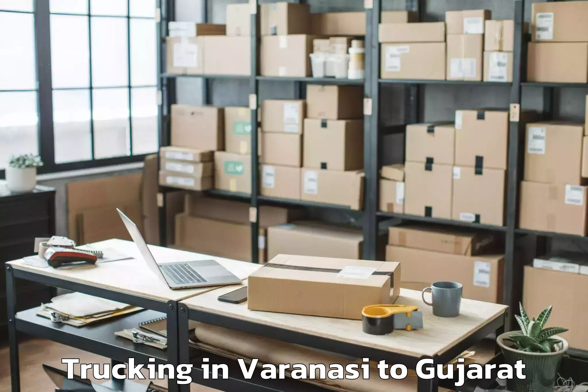 Trusted Varanasi to Navsari Agricultural Universit Trucking